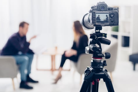 Professional interview setup capturing expert discussion for live social media audience engagement.