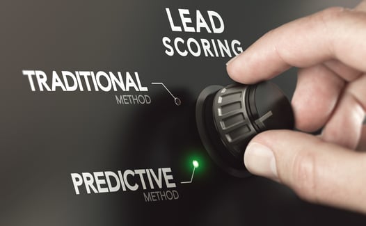 Hand adjusting dial from traditional to predictive lead scoring method for a smarter sales qualification process.