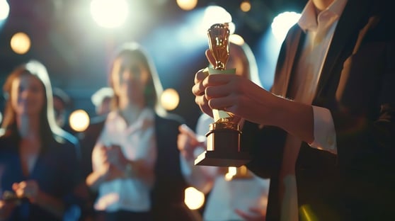 Person receiving award.