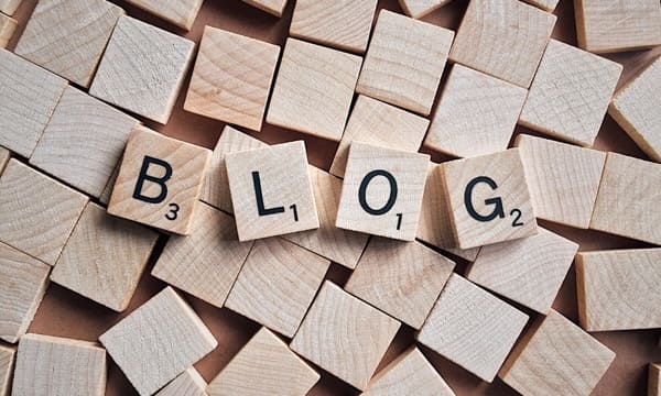 Wooden blogs with letters, spelling out BLOG.